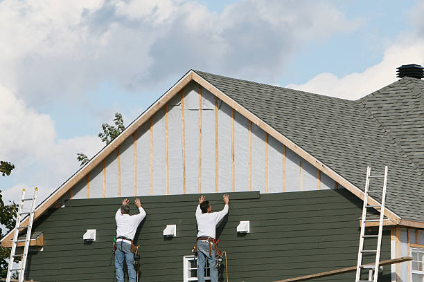 Professional Siding Replacement technician working in Greenville, PA